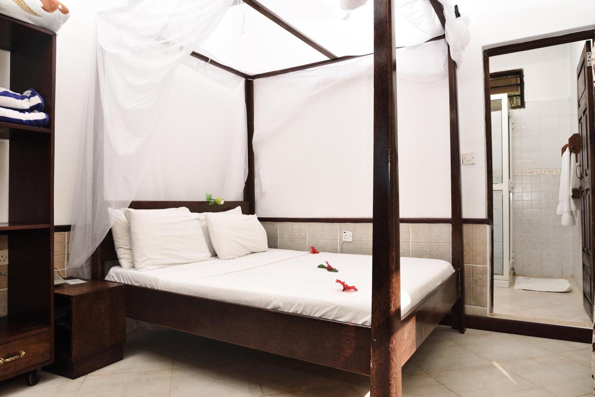 Mnarani Beach Cottages Nungwi Quarto foto
