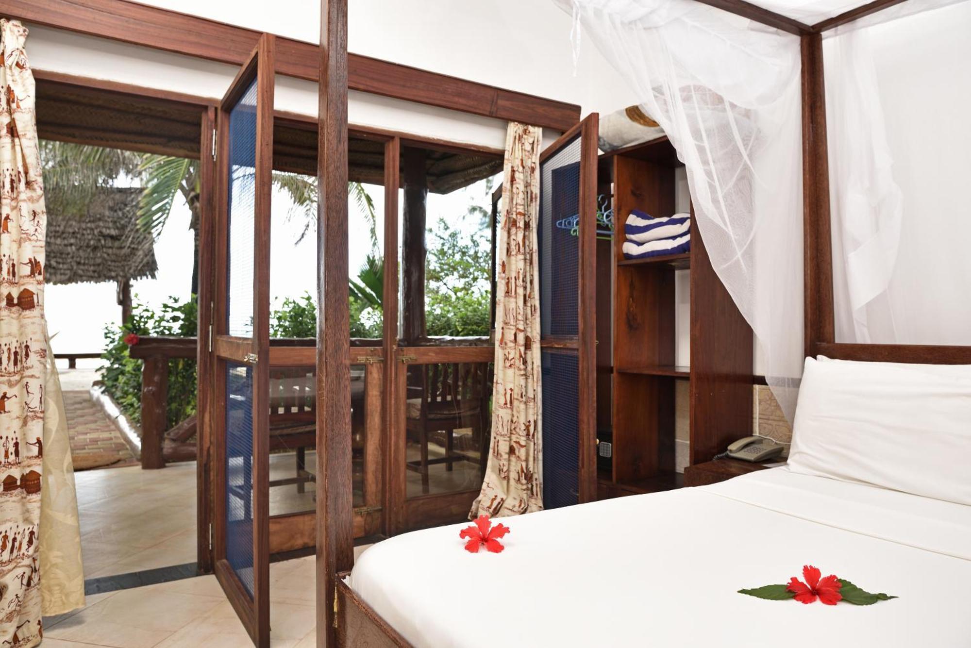 Mnarani Beach Cottages Nungwi Quarto foto