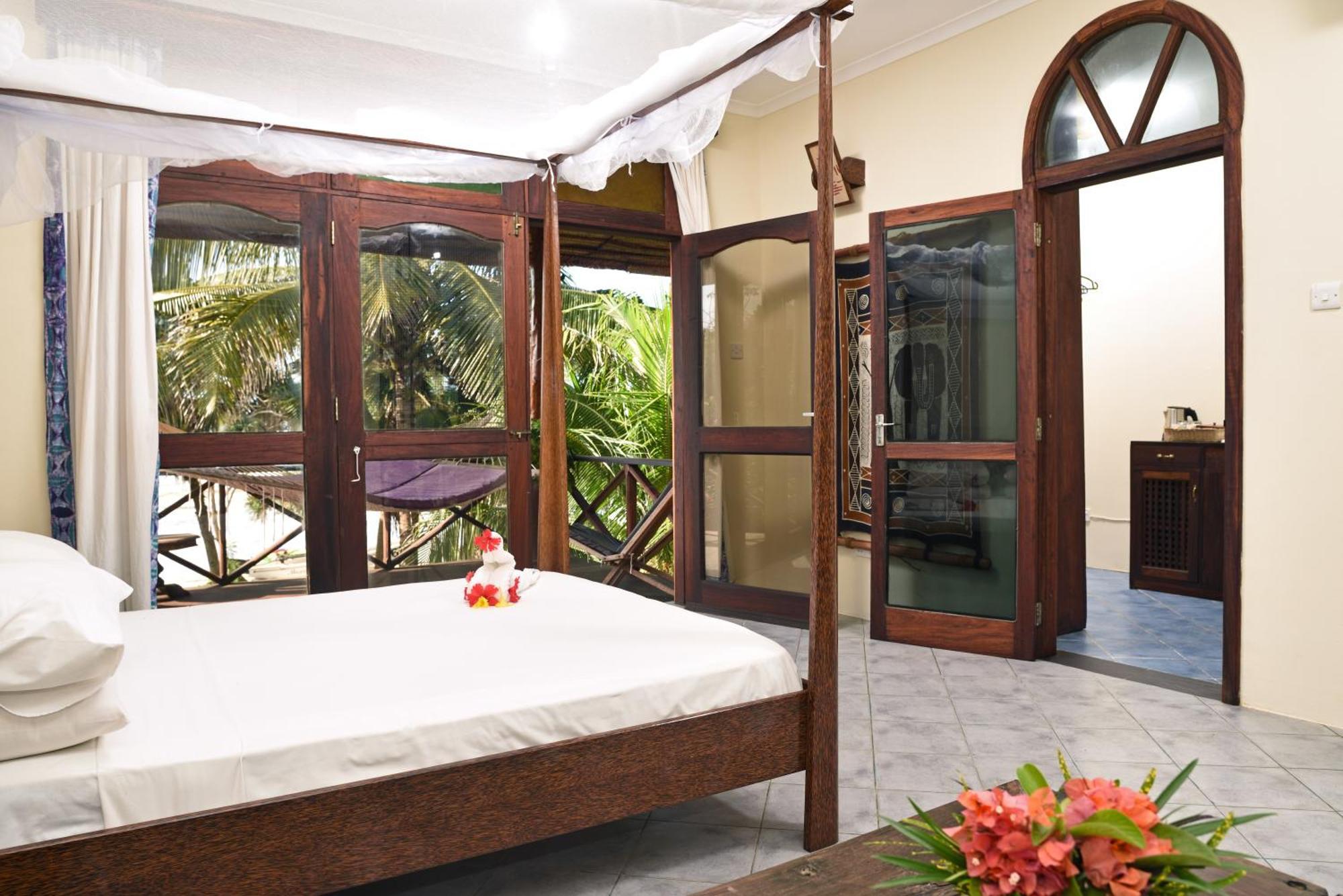 Mnarani Beach Cottages Nungwi Quarto foto
